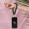 Guess Univerzális kézpánt 4G Charm fekete